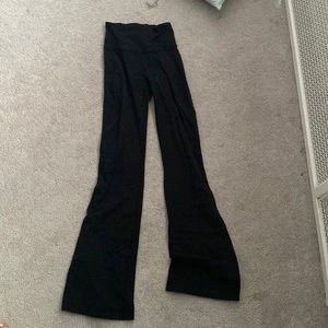 Size 2 black lululemon flare pants, slightly worn.